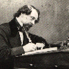 dickens writing at desk