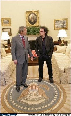 President George W. Bush and U2's Bono in the Oval Office