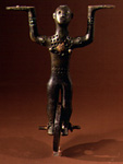 Bronze wheeled female figure