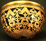Reconstructed gold foil ornament originally applied on cup of organic material