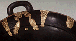 Details of gold foil around handle (interior).