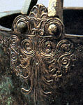 Detail views of situla handle attachment