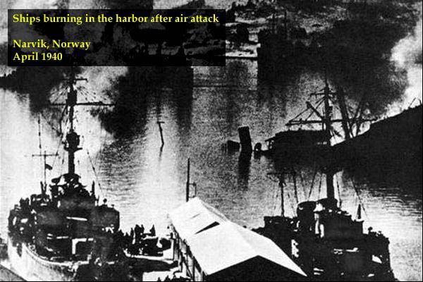 Ships burning in the harbor after air attack, Narvik, Norway, April 1940